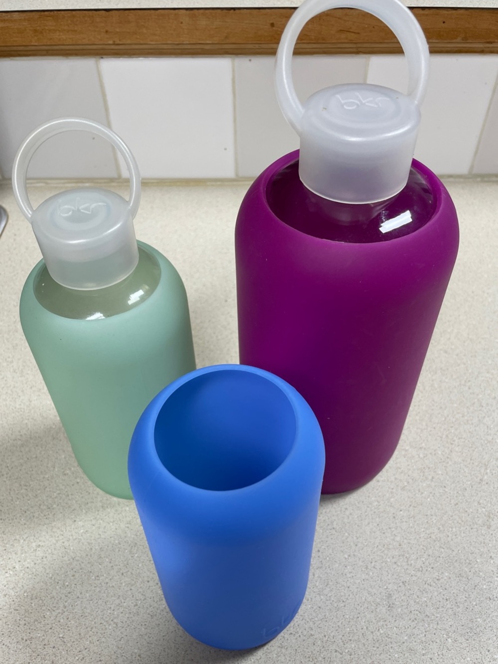 bkr Glass Water Bottles in Purple, Mint & Blue Silicone Sleeves